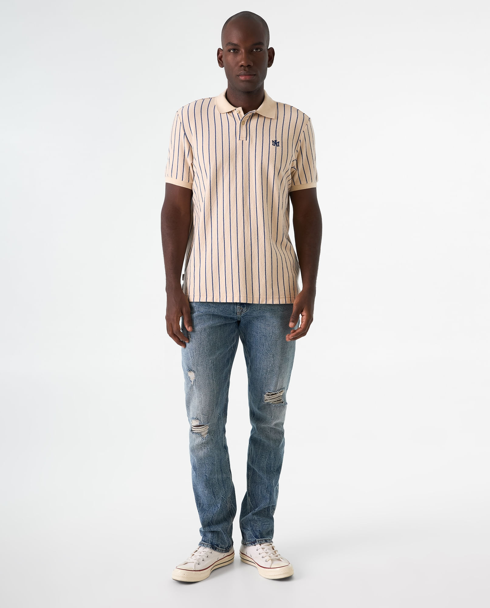 Polo de tela texturizada a rayas para hombre