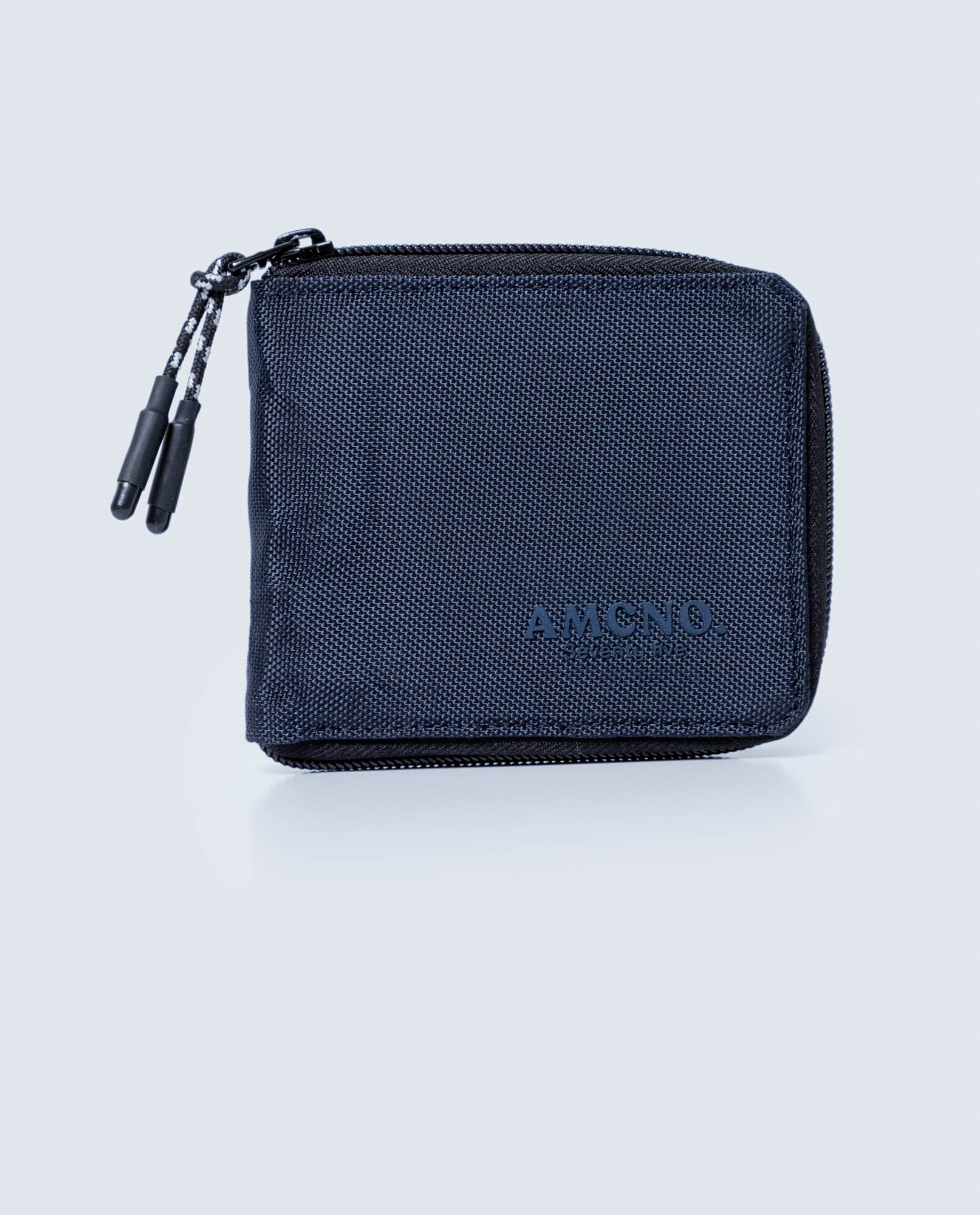 Bolso compacto en poliéster minimalista con cremallera