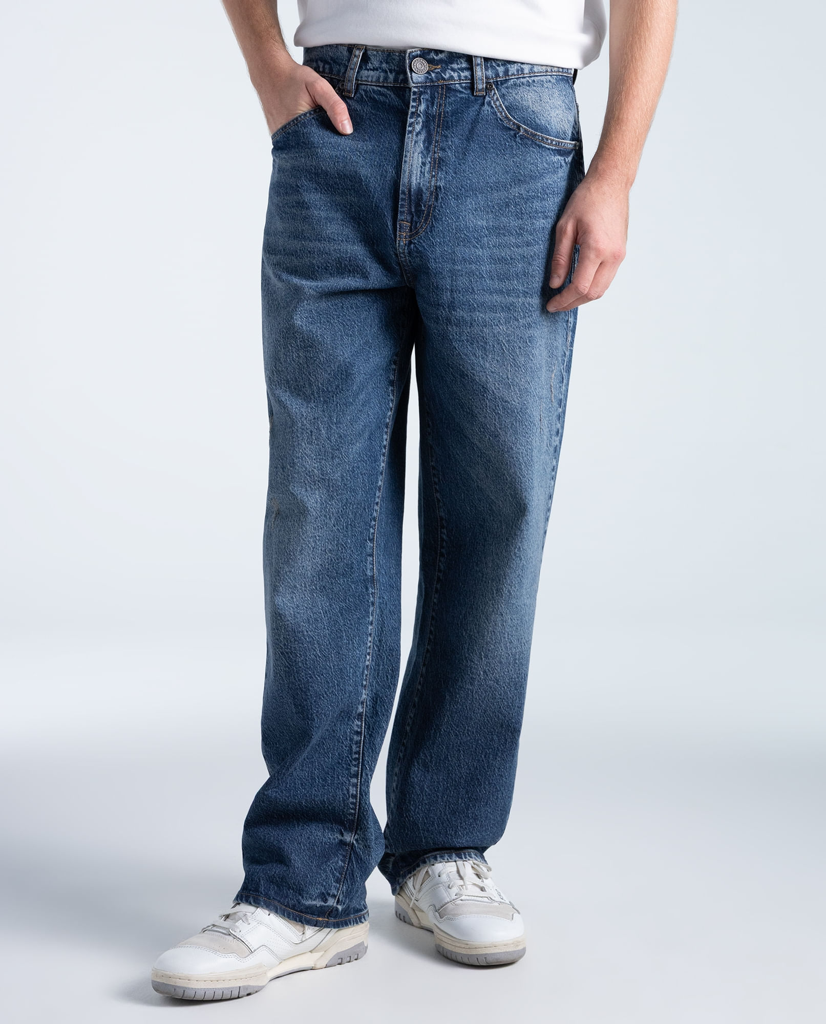Jeans regular en algodón tiro medio con rotos
